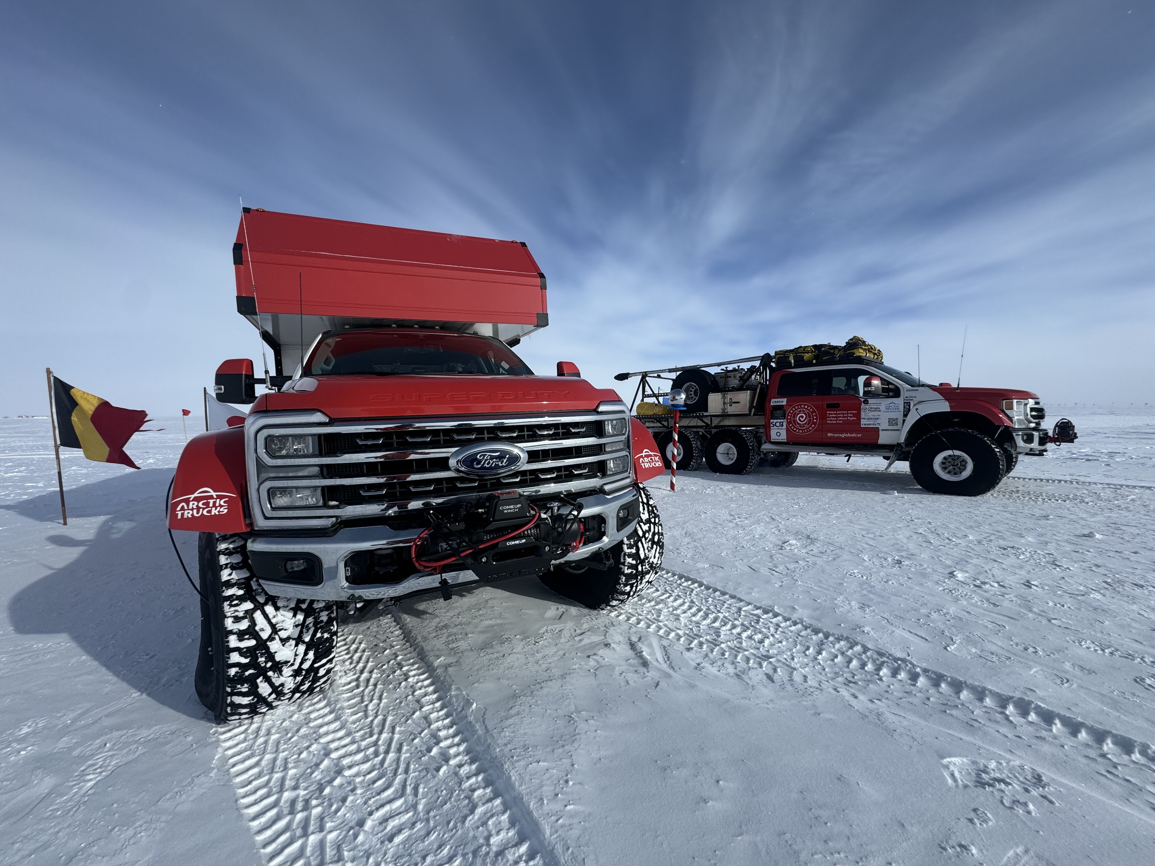 A modified Super Duty Truck is parked on the snow in Antarctica.